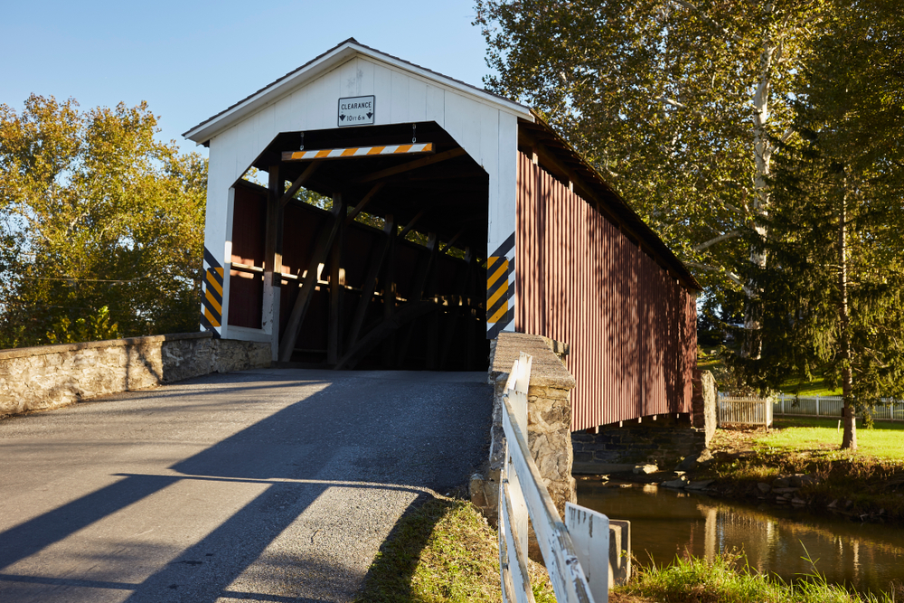 Erb's Mill Covered Bridge, Amish Country, Lititz, Lancaster County, Pennsylvania, USA on a late summer day. living in lancaster pa area has lots of small town charm